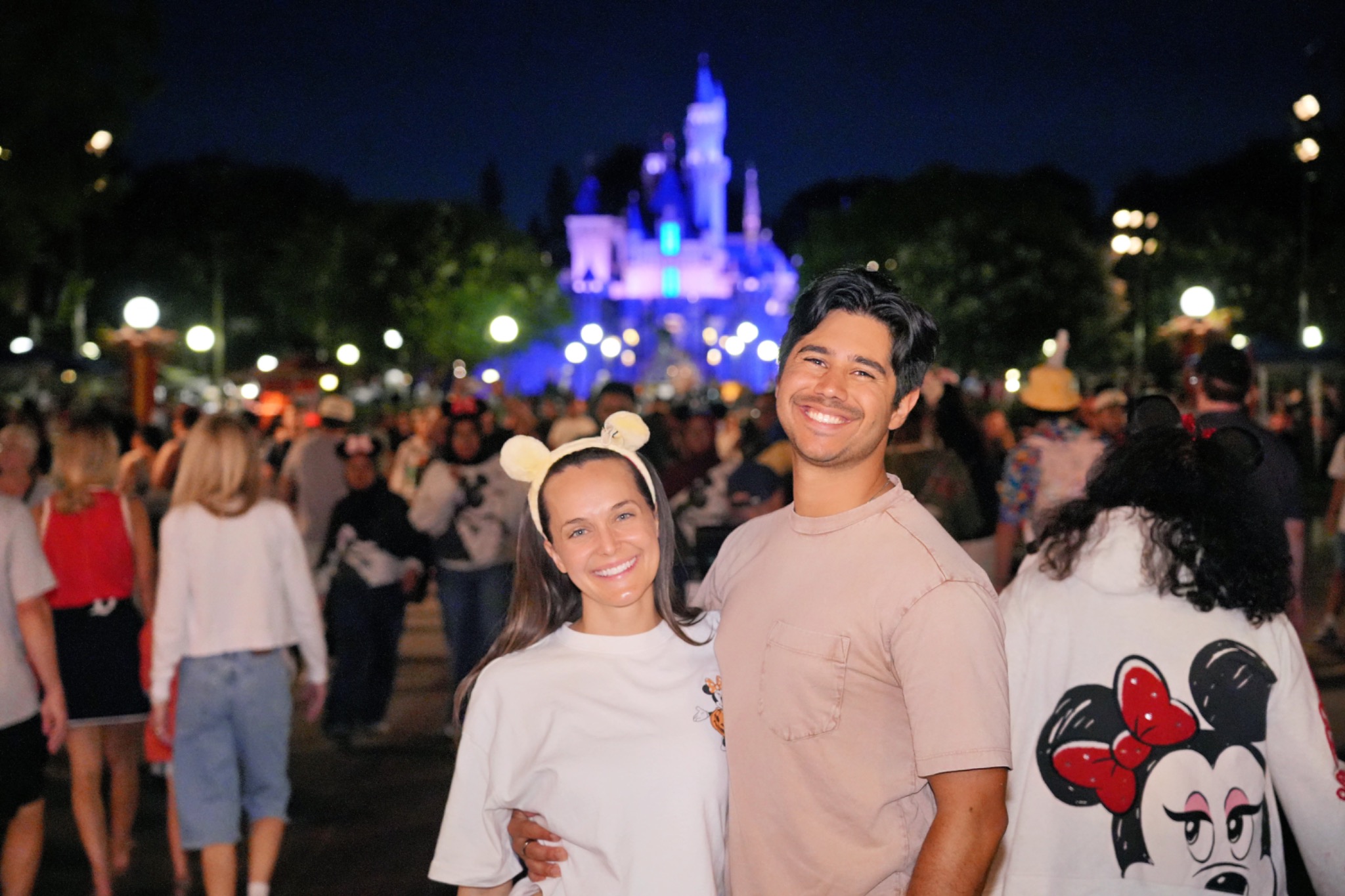 Laney and Rhett enjoying an evening at a theme park